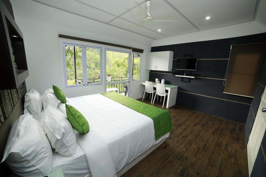 Moselberg Riverside Cottages Munnar Εξωτερικό φωτογραφία